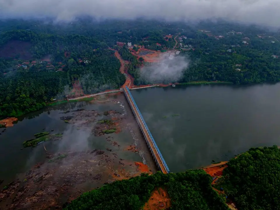 Aerial view of a jetty crossing a river estuary